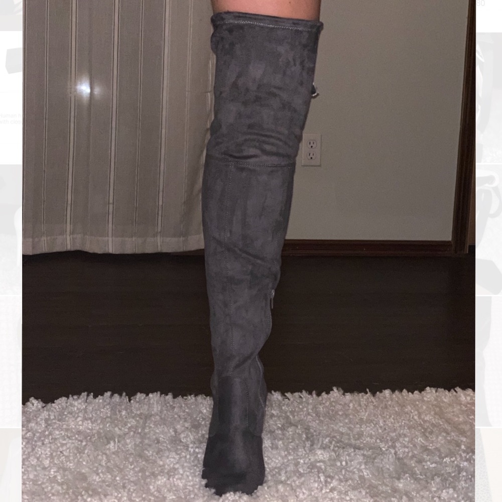 Over the knee, heeled boot!
